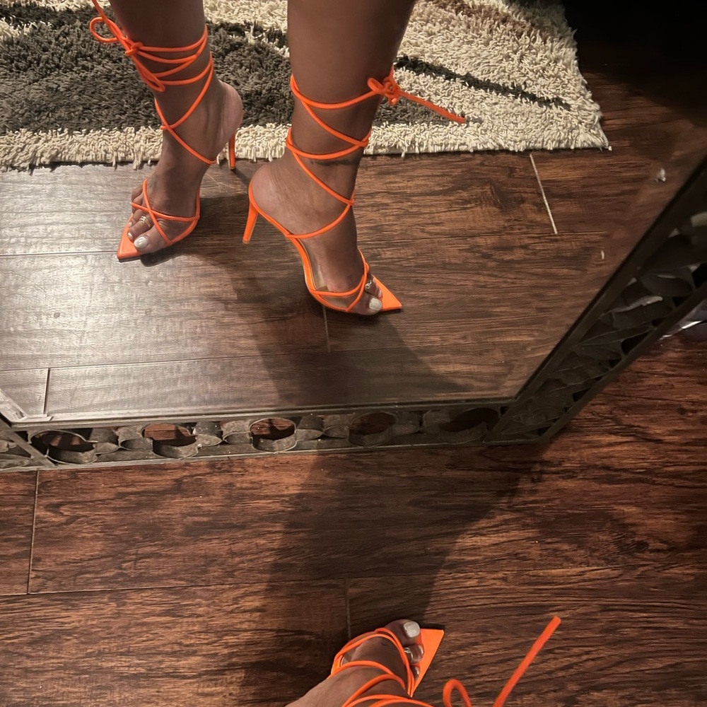 Scrappy, sex, orange heel.  Size 11; fits more like me a size 10.